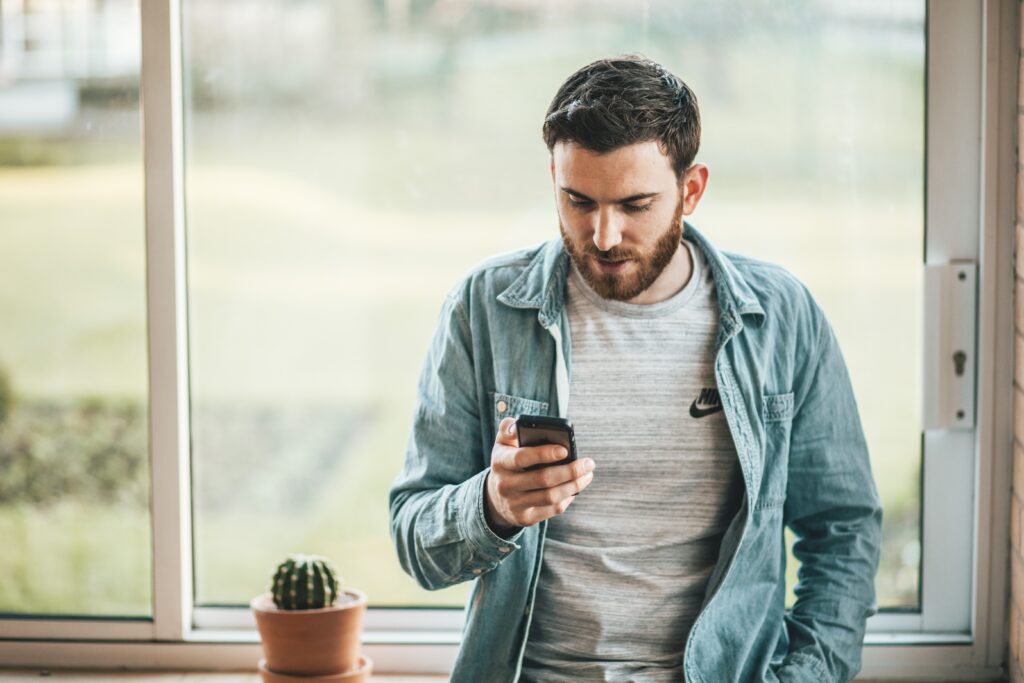 a man doing a voice search